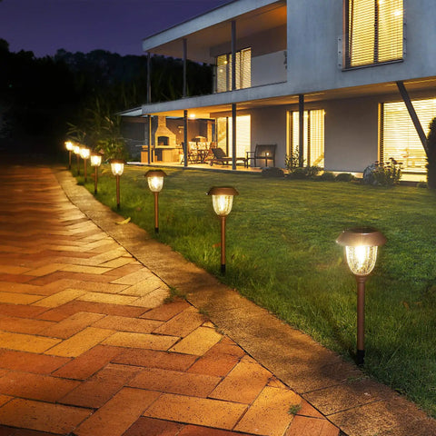 Six Pack Solar Pathway Lights Outdoor 25 Lumens Warm White 3000K IP65 Weatherproof Metal And Glass Landscape Lights illuminating walkway