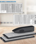 Badass DIY Self Ink Stamp Kit With Swap Out Character Panels And Tweezers Designed For Quick Return Address Stamping Small Business Parcel Or Thank You Card Layouts showing two character sets on a wooden table.
