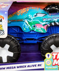Mega-Wrex 1:15 Scale RC Monster Truck With Lights And Sounds in packaging, showcasing colorful dinosaur-themed design and large wheels.