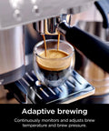 Glass of espresso brewing on R-ES601 Luxe Café Premier Series 3-In-1 Espresso Machine For Espresso, Drip Coffee, And Cold Brew With Built-In Grinder.