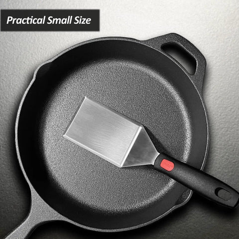 Heavy Duty Cast Iron Skillet Spatula With Full Tang Silicone Handle, Heat Resistant Commercial Grade Burger Press Spatula Flipper For Cooking And Serving, 2.7 Inch Wide shown in a skillet