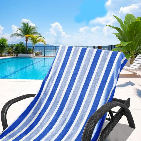 Blue and white Ultra Plush Micro Fleece Lounge Chair Towel Cover Set Of 2 With Quick Dry Non Slip Backing at a poolside