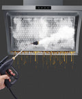 Dude This 1700W Steam Cleaner Is A Total Beast And Perfect For Deep House Cleaning, sanitizing a greasy range hood with steam.