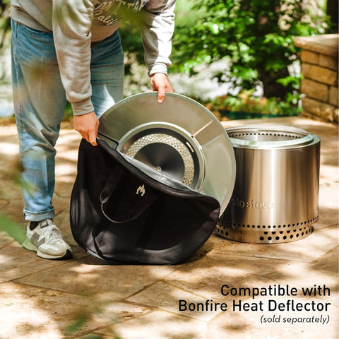 Person placing deflector in Medium Heat Deflector Carry Bag For Bonfire Accessories Weather Resistant Protective Gear Case