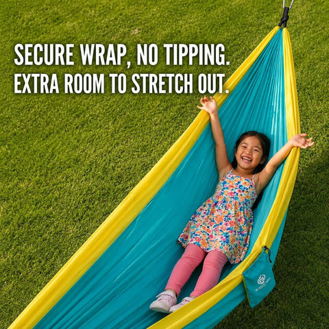 Child enjoying Ultra Lightweight Camping Hammock With 500 Lb Capacity And Tree Straps for outdoor adventures