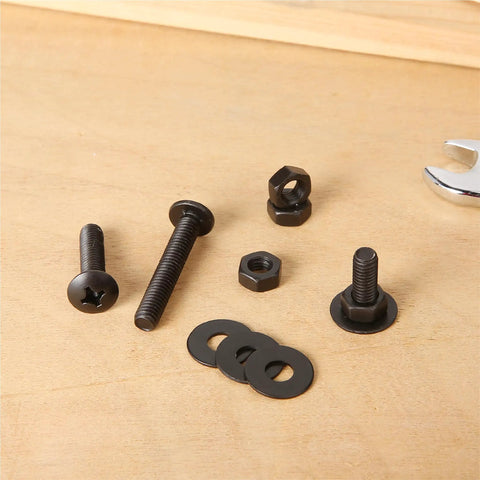 Nuts And Bolts Assortment Kit 113 Pieces Galvanized Iron Hardware Set For Home DIY Projects laid out on wooden surface