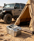 Heavy Duty 304 Stainless Steel Water Storage Canister 10 Liter Liquid Container next to a tent in a desert setting