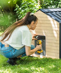 Woman installing Automatic Chicken Coop Door Opener With Battery Power Weatherproof Aluminum Build Smart App And Timer Control Predator Proof Easy