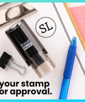 Quit The Daily Grind With This Rock Solid Self Inking Inspection Stamp Built For Fast Track Quality Approval And Seamless Record Keeping On Busy Office Floors Or Local Shop Workbenches on a desk with a clip and pen.