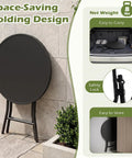 Compact Outdoor Folding Side Table With Tempered Glass Top And Heavy Duty Steel Frame For Backyard Hangouts shown folded against a wall.
