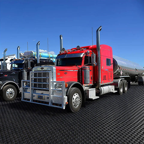 Red truck on Vodaland Permeable Pavers EasyPave Grass And Gravel Driveway Grid 2 Inch Depth 35 Square Feet 14 Units Black