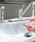 Premium Single Handle High Arc Kitchen Faucet With Swivel Side Spray, Polished Chrome Finish, water streaming from spout.