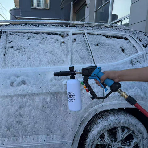 5000 PSI Beast Power Pressure Washer Gun With Swivel and Foam Cannon cleaning a car, showcasing heavy-duty application.