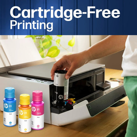 Person refilling a Refillable All In One Wireless Printer For Home Office With Scanner And Copier EcoTank Alternative Cartridge Free Printing With Two Years Of Ink Included No Fuss Setup And Reliable Ink Savings.