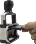 Heavy Duty Self Inking Stamp With Dual Color Blue Red Ink, Preloaded Office Messages And Built In Dater, shown being loaded.