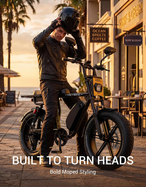 Man in a leather jacket with helmet on a Dual Battery Adult Electric Bike With 956 Wh Juice And A Mean 1800W Motor Logging Ninety Miles Smooth Full Suspension Hydraulic Disc Brakes 20X4 Fat Tires Moped Styled Build Long Bench Seat Tuned For Urban Adventures.