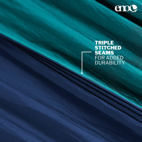 Close-up of Lightweight One Person Portable Hammock For Camping Hiking Backpacking Travel Festivals And The Beach Seafoam Navy showing triple stitched seams
