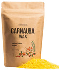 Straight Up Pure Carnauba Wax Flakes For Smooth Skin Care And Lip Balm Making Real Deal Vegan Candle Wax With Leather And Wood Finish Must Have DIY Staples Eight Ounce Bag in brown packaging with yellow flakes.