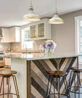 Kinsley Pendant Light In Aged Galvanized Steel for farmhouse kitchen island, rustic charm over island with stools.