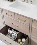 Antique Brass Cabinet Pulls 5 Inch Hole Centers 128mm Zinc Alloy Handles installed on wooden drawers in kitchen setting