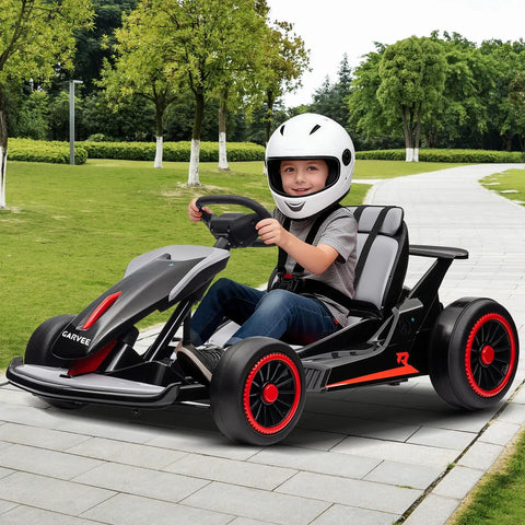 Child riding 24V Electric Go Kart For Kids 6 To 12 With Dual 200W Motors, 8.1 MPH Speed, Drift And 360 Spin, in park