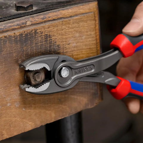 8 Inch Comfort Grip Pliers with front and side gripping holding a hex bolt, 5 position push button adjustment visible
