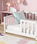Twin Size Floor Bed With Heavy Duty Plywood Slats And Safe Guardrails Zero Box Spring Hassle Game Changer Sleep Setup Easy Assembly Durable Core Rock Solid Frame For Kids Rooms In Crisp White in a stylish room with pastel decor.