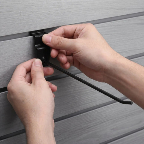 Heavy Duty Iron Shelf Hooks 20 Pack For Slatwall Slot Board And Pegboard 4mm Rod Thickness Burrfree Polished Finish No-Drill Mounting For Supermarkets And Convenience Store Displays being installed