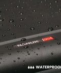 Freakishly Durable IP67 Waterproof Hard Shell Case Built For Tough Travel Days with water droplets on matte black finish.
