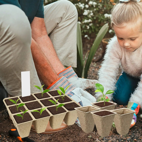 Child and adult planting with Biodegradable Peat Pots Seed Starter Tray Kit With 240 Cells And 20 Plant Labels for gardening