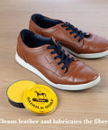 Yellow Saddle Soap Leather Cleaner And Conditioner All In One For Boots Kicks Bags Saddles And More next to brown sneakers