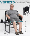 Person sitting on Oversized Folding Chair For Outdoors With All Day Comfort And Fully Padded Seat And Back, 450Lbs Heavy Duty Portable Camp Chair With Side Table And Pockets, Great For Picnics, Lawn, Camping And Concerts, showing size measurements.