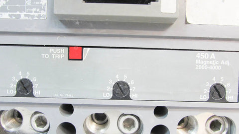 Top Shelf 450 Amp 600 Volt Three Pole Industrial Circuit Breaker close-up of push to trip button and settings.