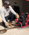 Auto Feed Electric Drain Cleaner Machine Delivers Heavy Duty Torque To Knock Out Thick Grease Clogs And Tree Roots Instantly For 3/8 Inch Drain Pipe Or 1 To 4 Inch Line Runs Nailed Every Time in use by a professional.
