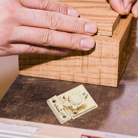 Two-Pack Heavy Duty Jewelry Box Latch With Decorative Turtle Lock Buckle shown near a wooden box, easy to install hardware