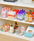 Straight Up Sturdy 12 Pack Clear Plastic Storage Bins With Handles For Pantry Organizing Cabinet Shelving with various items inside.