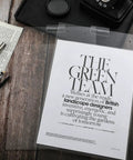 Three Pack 8.5x11 Clear Slat Wall Sign Holders For Menus And Flyers displaying a magazine page on a wooden desk