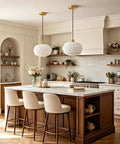 Vaziden Milk Glass Pendant Lights Kitchen Island Gold Chandelier 11.81" in a modern kitchen with white shade and gold accents.