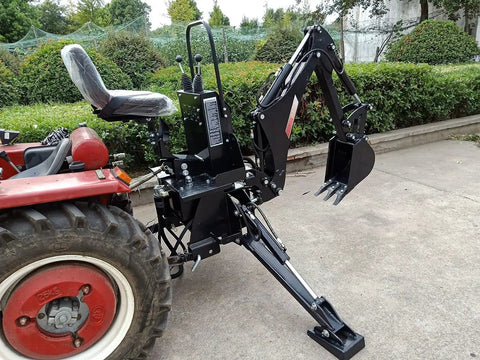 Three Point Hitch PTO Hydraulic Backhoe Attachment For Tractors With 10 Inch Or 15 Inch Bucket Beefed Up 4928 Lb Digging Force 6 Foot Digging Depth 180 Degree Swing Tank Included Fits John Deere Kubota And More attached to red tractor on concrete
