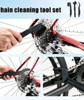 Chain cleaning tool set demonstrating use on bike gears, part of All In One Bike Cleaning Kit With Chain Degreaser, Chain Scrubber.