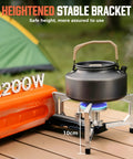 All In One Compact Portable Butane Camping Stove With Foldable Bucket Style Design And Included Carry Bag For Camping Outdoor Cooking And Emergency Use Orange Color Great For Backpacking Picnics with kettle on stable bracket.