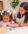 Girl assembling Wooden Bird House Kit For Kids To Build And Paint A Fun Diy Arts And Crafts Project Ages 5 12 with adult assistance