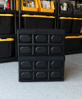 Big Time Heavy Duty Collapsible Storage Bin With 16 Gallon Capacity, stacked in black, ideal for garage organization.