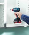 Using 10-Pack 3 And A Half Inch Phillips No. 1 Impact Tough Screwdriving Bits on a cabinet with a power driver tool