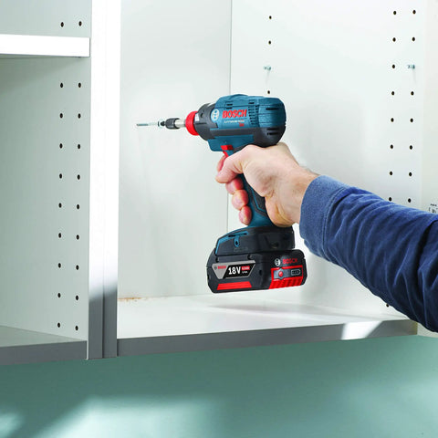 Using 10-Pack 3 And A Half Inch Phillips No. 1 Impact Tough Screwdriving Bits on a cabinet with a power driver tool