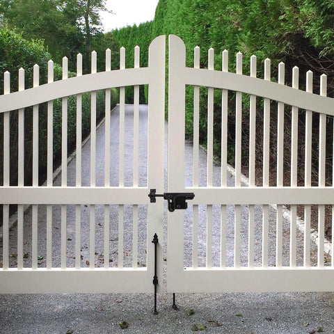 Heavy Duty Slide Bolt Gate Latch With Padlock Hole installed on a white wooden gate, designed for outdoor use, dual direction.