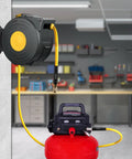 Garage setup with Three Eighth Inch Lead In Air Hose Six Feet Long With One Quarter NPT Quick Coupler And Plug 300 PSI Yellow Whip