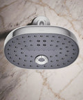 Overhead view of Statement Three Function Showerhead With Katalyst Air Induction For Big Drops And Power, polished chrome finish.