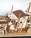 Heavy Truck 3D Wooden Puzzle Kit For Adults No Glue Needed No Tools Required Eco Friendly Plywood Brain Teaser Hobby Set For Model Builders And Home Decor assembled wooden semi truck with trailer on table