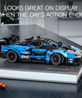 Technic McLaren Senna GTR 42123 racing collectible model car build kit sleek display on black book, detailed V8 engine view